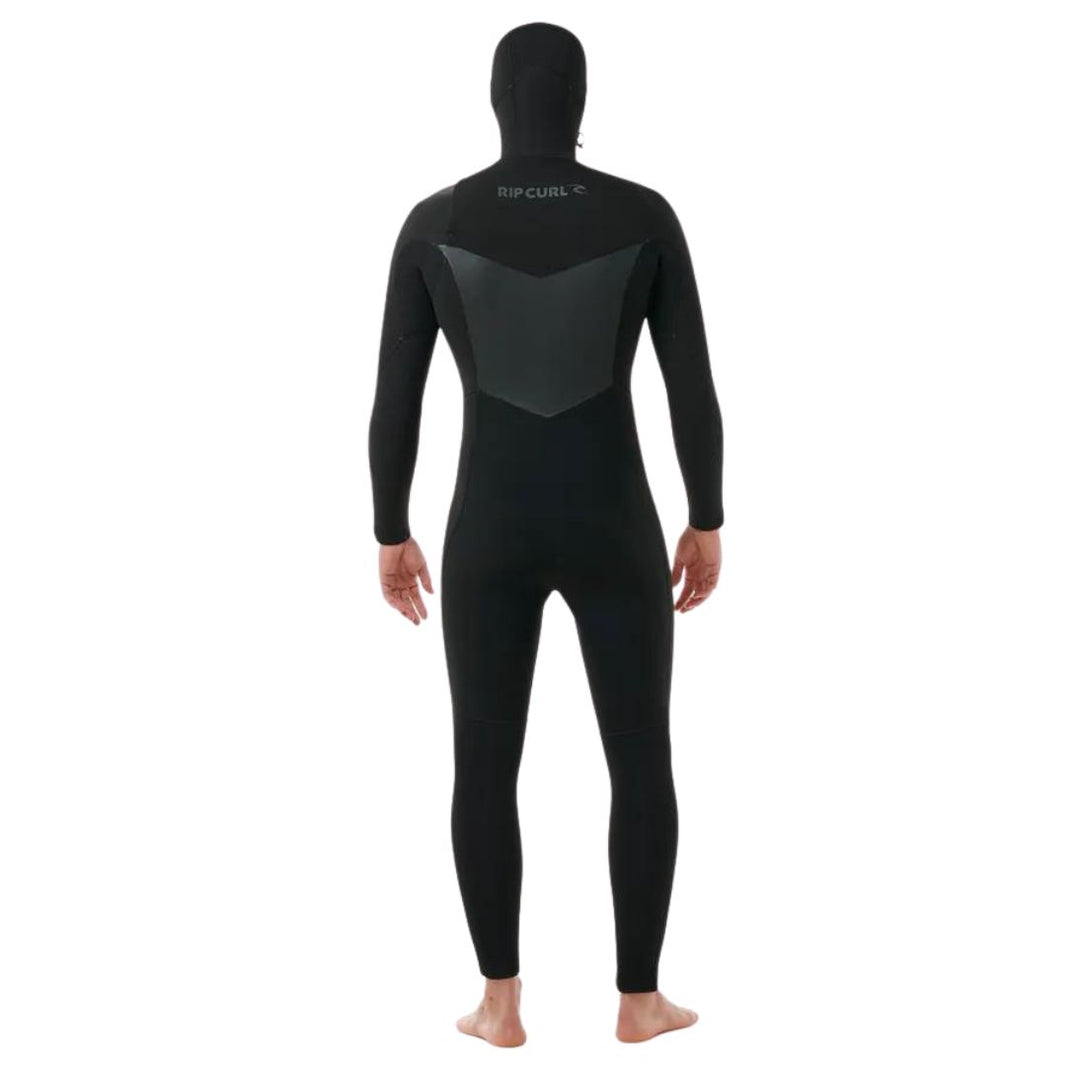 A male model wearing a Rip Curl Dawn Patrol 5/4mm black mens hooded wetsuit with a chest zip feature and yulex rubber. View of the back