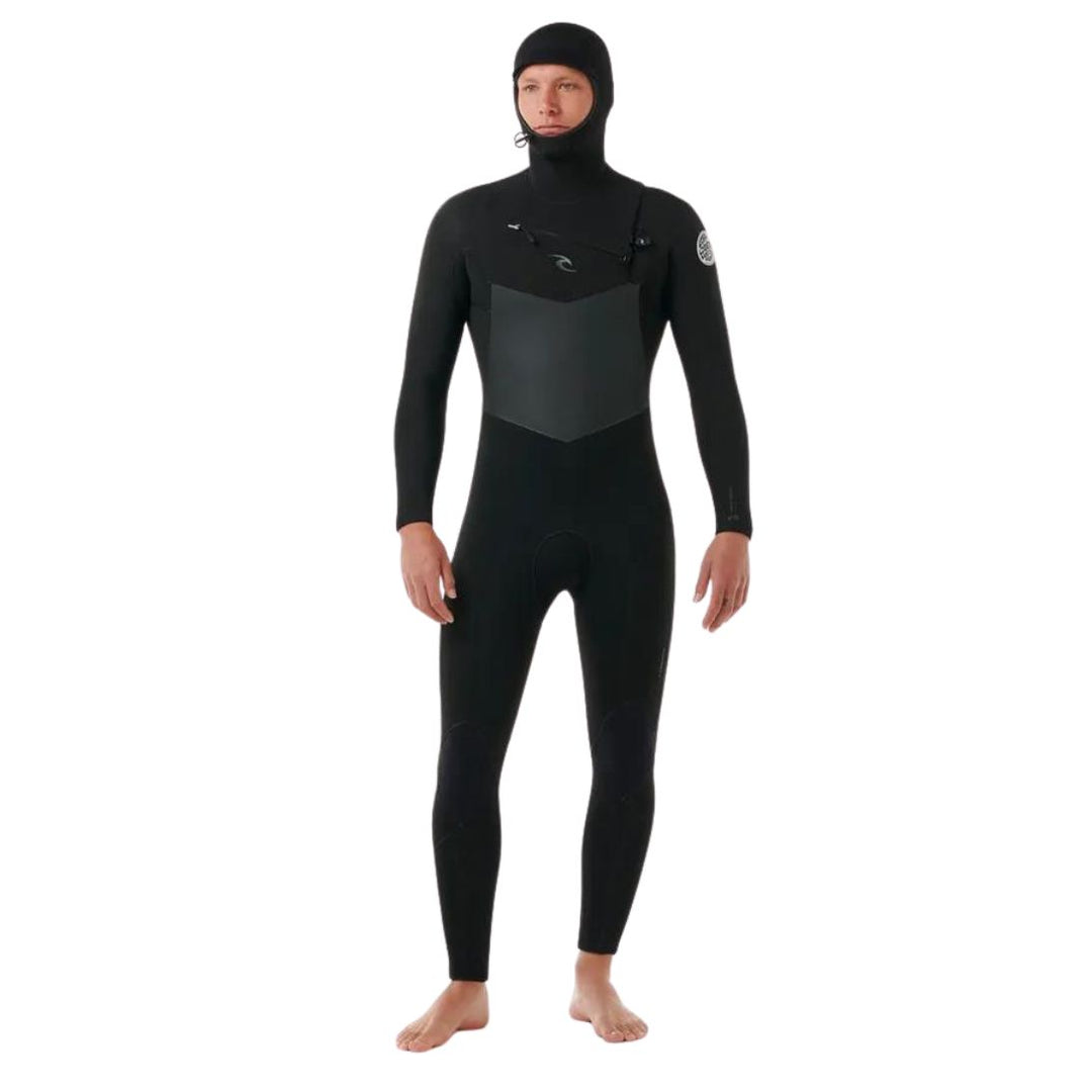 A male model wearing a Rip Curl Dawn Patrol 5/4mm black mens hooded wetsuit with a chest zip feature and yulex rubber. View of the front