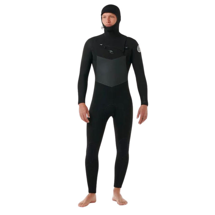 A male model wearing a Rip Curl Dawn Patrol 5/4mm black mens hooded wetsuit with a chest zip feature and yulex rubber. View of the front