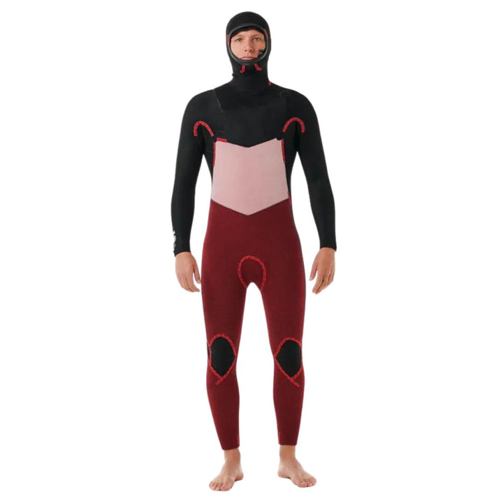 A male model wearing a Rip Curl Dawn Patrol 5/4mm black mens hooded wetsuit with a chest zip feature and yulex rubber inside out. View of the front