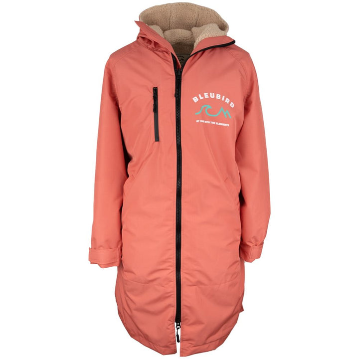 A long-sleeved coral-colored Bleubird Nordic outdoor changing robe with a hood, sherpa lining, and a front zipper.