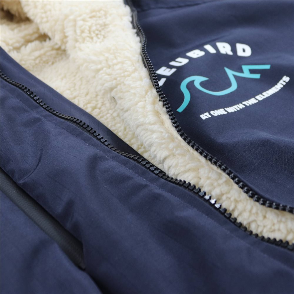 A long-sleeved navy-colored Bleubird Nordic outdoor changing robe with a hood